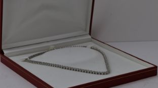 Fine 18ct gold designer KOJIS diamond necklace. Set in white gold with an estimated 8 carats of diam