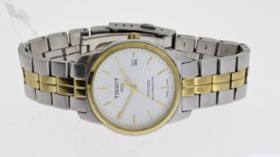 TISSOT PR100 AUTOMATIC, circular silver dial with baton hour markers, date aperture at 3 o'clock,