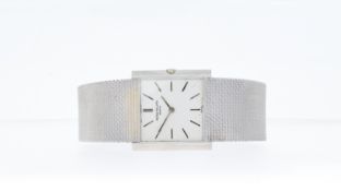 VINTAGE 18CT WHITE GOLD PATEK PHILIPPE DRESS WATCH, circular dial with baton hour markers, 26mm