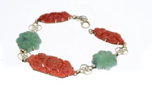 EARLY 20TH CENTURY CORAL AND JADE CARVED PANEL BRACELET