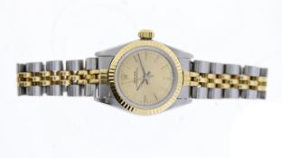 LADIES ROLEX OYSTER PERPETUAL 67193 CIRCA 1988, circular champagne dial with baton hour markers,
