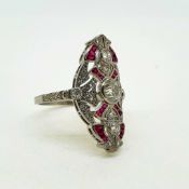 Platinum plaque ring with rubies and bezel set diamonds