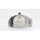 VINTAGE ROLEX OYSTER PERPETUAL DATE 1500 CIRCA 1966, circular silver dial with baton hour markers,