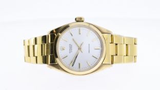 VINTAGE 9CT ROLEX OYSTER PRECISION, circular silver dial with baton hour markers, 35mm 9ct gold