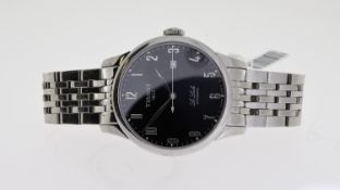 TISSOT LE LOCLE AUTOMATIC, circular black dial with arabic numeral hour markers, date aperture at