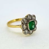 18YG Emerald and diamond cluster ring E0.90 D1.05