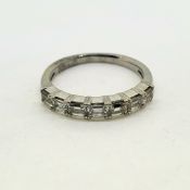 Platinum baguette 7 stone ring, marked PT950