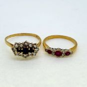 Two yellow gold rings with sapphires, diamond and rubies 18 carat