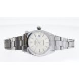 VINTAGE ROLEX OYSTER PERPETUAL DATE CIRCA 1964, circular silver dial with baton hour markers, date
