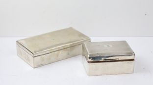 Antique silver pair of cigarette cases , both are wooden lined. Weighs 588 g