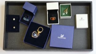 Genuine Swarovski jewellery in their boxes . 5 pieces total.