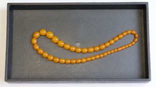 Vintage pressed amber russian bead necklace weighs 71 g