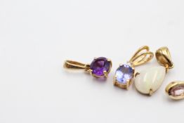 4 X 9ct Gold Gemstone Set Pendants Inc. Opal, Pink Sapphire, Tanzanite & Amethyst (2.1g)
