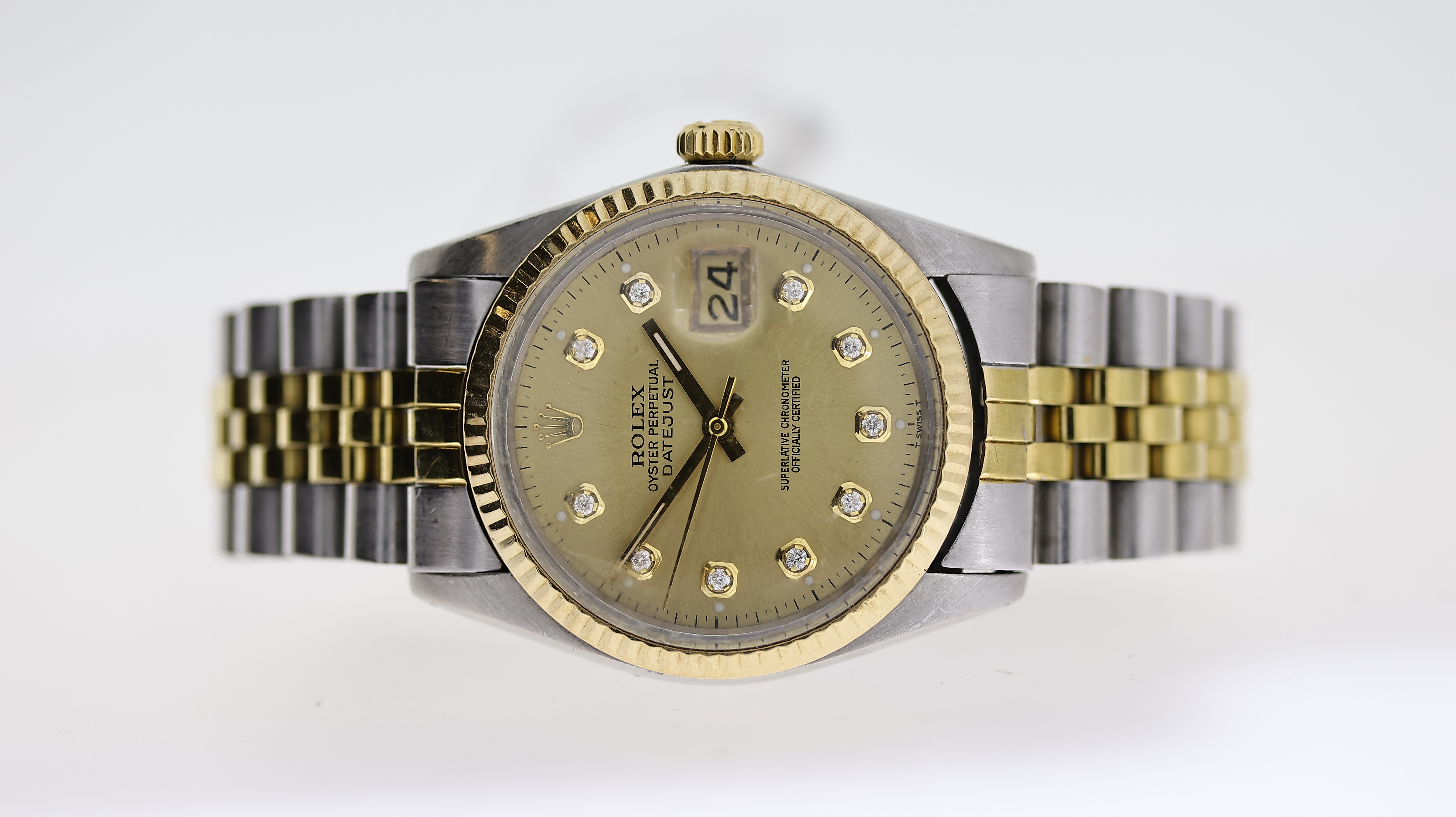 ROLEX DATEJUST STEEL AND GOLD DIAMOND DOT REF 16013 CIRCA 1981, circular champagne dial with diamond