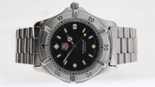 TAG HEUER PROFESSIONAL REF WE1110-R, approx 36mm black dial, baton hour markers, date aperture at