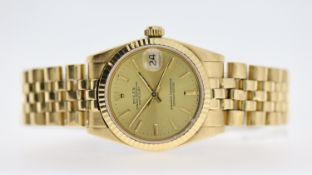 18CT ROLEX OYSTER PERPETUAL DATE REFERENCE 68278, circular champagne dial with baton hour markers,
