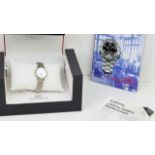 LADIES TISSOT REF T825/925 W/BOX, approx 24mm white dial, Roman Numeral hour markers, date