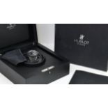 HUBLOT SUPER B BLACK MAGIC FLYBACK CHRONOGRAPH WITH BOX REFERENCE B 1926.12, circular gloss black