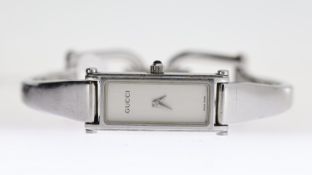 LADIES GUCCI REF 1500L, approx 12mm silver dial, stainless steel bezel and case, Gucci bracelet,