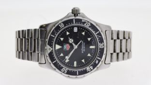 TAG HEUER PROFESSIONAL REF 973.006, approx 36mm black dial, arrow hour markers, date aperture at 3