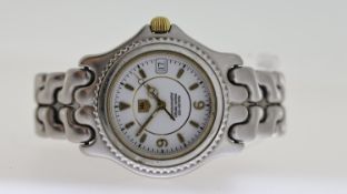 TAG HEUER CHRONOMETER REF 04627, approx 35mm white dial with baton & Arabic hour markers, date
