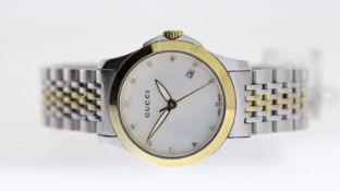 LADIES GUCCI REF 126.5, approx 26mm mother of pearl dial, round jewel hour markers, date aperture at