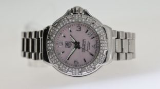 LADIES TAG HEUER FORMULA 1 REFERENCE WAC1216, pink dial with diamond set bezel, 38 mm case (inc