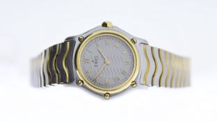 18CT EBEL WAVE REF 1157111, approx 23mm wave-effect grey dial with gold Roman Numeral hour