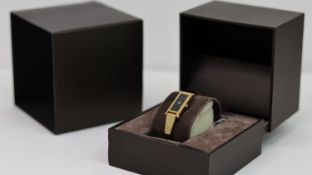 LADIES GUCCI REF 1500L, approx 12mm black dial, gold plated bezel and case, quartz movement, not