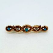 Tests 15ct gold twist bar brooch with turquoise and diamonds 4.5g