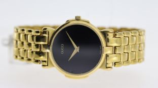 GUCCI REF 3400M, approx 27mm black dial, gold plated bezel and case, Gucci crown and integrated