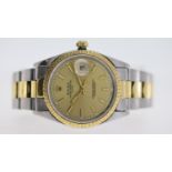 ROLEX OYSTER PERPETUAL DATE REFERENCE 15223, champagne dial, baton hour markers, engine turned