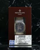 SEALED PATEK PHILIPPE NAUTILUS CALENDAR MOON PHASE REFERENCE 5712/1A WITH BOX AND PAPERS