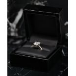 3.10CT DIAMOND RING, rectangular cut diamond, claw set, mounted in platinum, estimated colour and