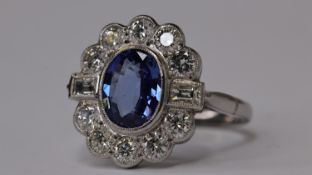 PLATINUM OVAL SAPPHIRE & DIAMOND CLUSTER RING WITH BAGUETTES AT SHOULDER TOPS S1.90 D1.15