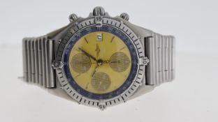 BREITLING CHRONOMAT REFERENCE 81950, circular champagne patina dial with baton hour markers,