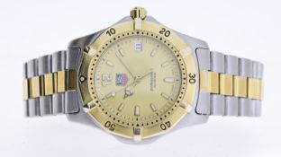 TAG HEUER PROFESSIONAL REF WK1121, approx 35mm champagne dial with baton hour markers, date aperture