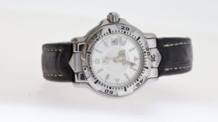TAG HEUER LADIES PROFESSIONAL REF WH1313-K1, approx 25mm silver dial with baton hour markers, date