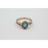 9ct gold diamond & topaz twist ring (2.9g)