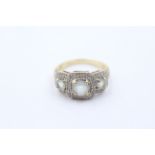 9ct gold amquamarine three stone ring with diamond frame (3.4g)