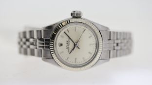 LADIES ROLEX OYSTER PERPETUAL REFERENCE 6619, silver dial, baton hour markers, fluted bezel, 24mm