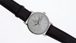 OMEGA AUTOMATIC DAY DATE REFERENCE 166.0117, silver dial, baton hour marlers, day and date aperture,