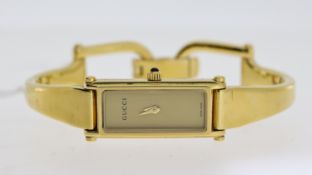 LADIES GUCCI REF 1500L, approx 12mm gold dial, gold plated bezel and case, quartz movement, not