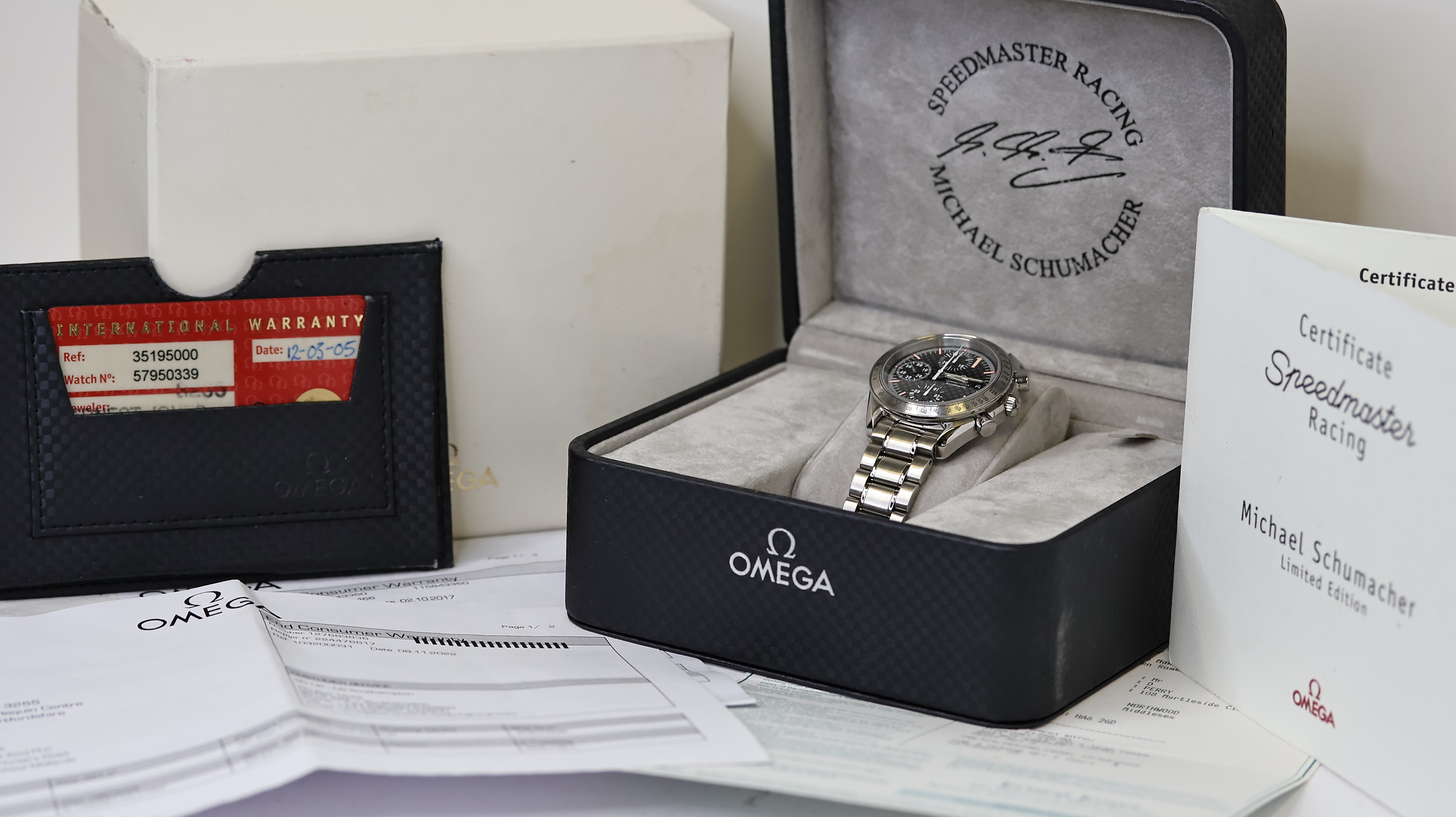 OMEGA SPEEDMASTER RACING MICHAEL SCHUMACHER BOX AND PAPERS 2005