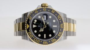 ROLEX BI COLOUR GMT MASTER II REFERENCE 116713 WITH BOX AND PAPERS DATED 2009, black dial with