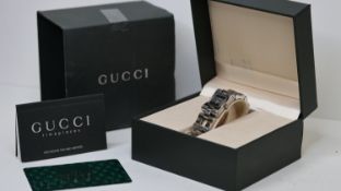 GUCCI BRACELET WATCH REFERENCE 2305L WITH BOX, small black dial, 17mm stainless steel case and