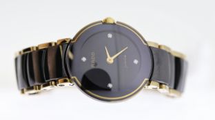 LADIES RADO JUBILE REFERENCE 153.0352, black dial, domed glass, ceramic and gold plated case and