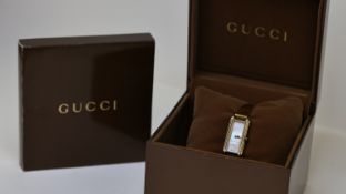 GUCCI MOTHER OF PEARL QUARTZ WATCH REFERENCE 109 W/BOX, rectangular mother of pearl dial, 15mm by