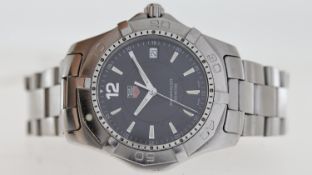 TAG HEUER AQUARACER QUARTZ REFERENCE WAF1110, circular black dial with baton hour markers,