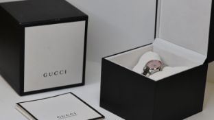 LADIES GUCCI MOTHER OF PEARL QUARTZ REFERENCE 126.5 W/BOX, circular mother of pearl dial with symbol